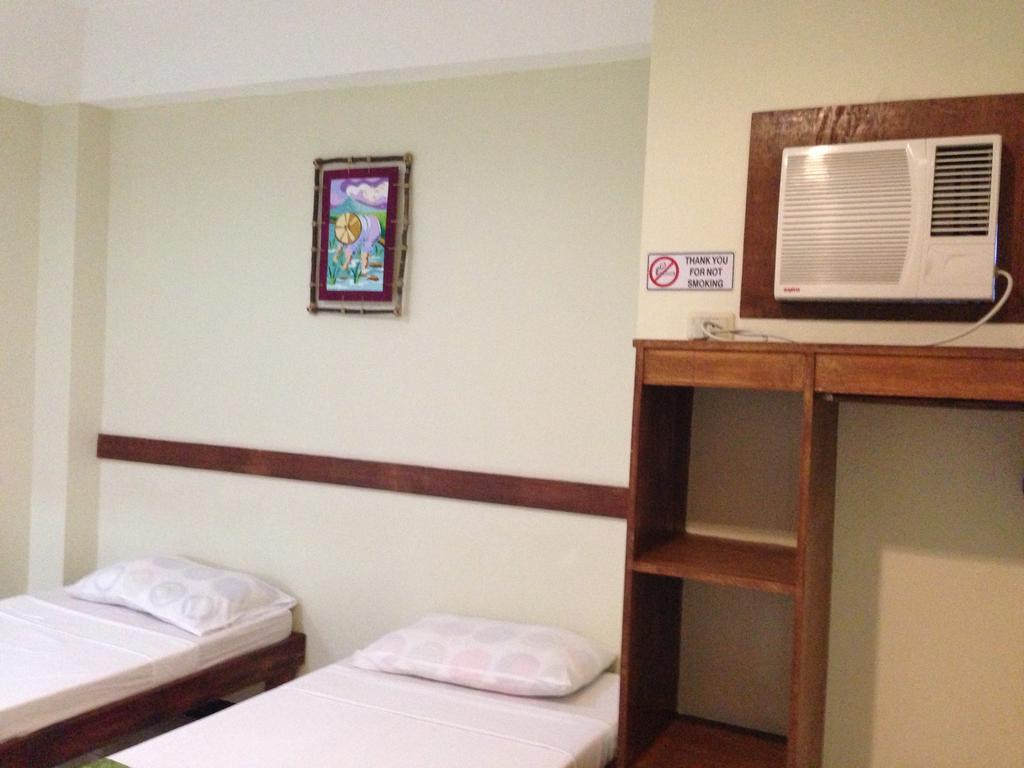 تاغبيلاران سيتي Qm Pension House الغرفة الصورة